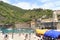 Lighthouse and olive terraces in Cinque Terre village Vernazza