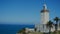 Lighthouse among palm trees by the sea in Morocco