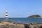 The lighthouse at Penmon Point Anglesey and puffin island