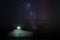 The lighthouse of Portman near Murcia at night with the Milky Way in the background.