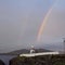 Lighthouse with rainbow, Ireland