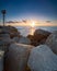 Lighthouse in Riccione port on the Adriatic sea at sunrise in summer