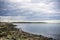 Lighthouse on the rocky coast of the Atlantic Ocean