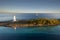 Lighthouse and sail ship at the tip of Paradise Island in Nassau, Bahamas