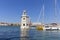 Lighthouse on San Giorgio Maggiore and view on tower St Mark`s Campanile, Doge`s Palace, Venice, Italy