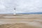 Lighthouse and sand dunes in Punta del Fangar (Spain)