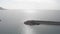 Lighthouse in sea, aerial drone view. Harbor with marina and lighthouse