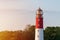 Lighthouse in seaport. Beautiful russian Baltiysk beacon. Scenery blue sky, copy space