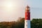 Lighthouse in seaport. Beautiful russian Baltiysk beacon. Scenery blue sky, copy space