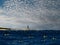 Lighthouse seascape with birds in flight