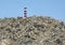 Lighthouse on a secluded cliff overlooking the Cabo San Lucas Bay near the Vista Encantada Resort.