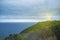 Lighthouse shining protective light over ocean