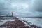 Lighthouse on the shore of the raging White sea on the Kola Peninsula