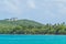 Lighthouse sits on a hill in Fajardo Puerto Rico surrounded by palm trees