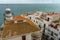 Lighthouse and some white houses on the coast in Pensacola Spain