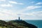 The lighthouse at Strumble Head, surrounded by the wild coastline and sea of Pembrokeshire. Wales