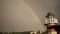 Lighthouse in the summer on rainbow background. Moscow