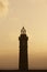 Lighthouse at sunset in Faial island. Ponta dos Capelinhos. Azor