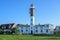 Lighthouse in Timmendorf, tourist destination on the island of Poel near Wismar in the Baltic Sea, Germany, blue sky with copy