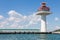 Lighthouse tower on the seacoast skyline