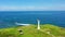 Lighthouse on a tropical island, top view. Basot Island, Caramoan, Camarines Sur, Philippines.