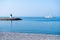 Lighthouse view, sailing luxury yacht. Beautiful morning sea background.