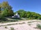 Lighthouse Water sea waves beach sand pebbles