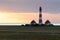 Lighthouse Westerhever at the North Sea in Germany at sunset