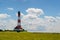 Lighthouse Westerhever in Schleswig Holstein, Germany. View on landscape by national park Wattermeer in Nordfriesland.