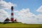 Lighthouse Westerhever in Schleswig Holstein, Germany. View on landscape by national park Wattermeer in Nordfriesland.