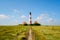 Lighthouse Westerhever in Schleswig Holstein, Germany. View on landscape by national park Wattermeer in Nordfriesland.