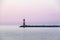 Lighthouse of the western pier at Rostock Warnemuende at twilight