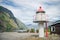 lighthouse and wooden building in beautiful mountains at Aurlandsfjord Flam