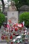 Lighting candles on tomb of a Polish poet