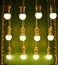 Lighting and Energy saving light bulbs. Green background. light-saving lamps sale in the store