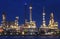 Lighting of oil refinery plant in heavy industry estate against