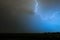 Lightning bolt cuts through the night sky