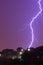 Lightning bolt by purple night sky