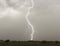 A Lightning Bolt Strikes a Rural Home
