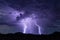 Lightning bolt thunderstorm background with rain and storm clouds.