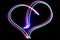Lightning heart neon generated with colored lights and a slow sh