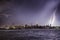 Lightning hitting a New York City skyscraper at twilight