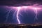 Lightning storm with huge electrical discharges on night sky, thunderstorm background