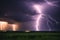 Lightning storm with huge electrical discharges on night sky, thunderstorm background