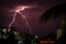 Lightning storm over the city buildings. Lightning bolt strike during a thunderstorm on metropolitan city. Dark sky with bright