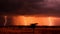 Lightning storm at sunset. Lightning strikes at dusk during the monsoon season. Spectacle of nature: lightning lights up the sky