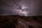 Lightning strike above Gooseberry Mesa in Southern Utah at night