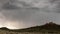 Lightning strike behind a sandstone formation on Kolob terrace road Utah