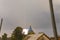 Lightning during a thunderstorm in the sky above the dome and cr