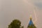 Lightning during a thunderstorm in the sky above the dome and cr